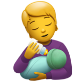 person feeding baby