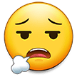 How emoji face exhaling displayed on Samsung