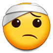 How emoji face with head-bandage displayed on Samsung